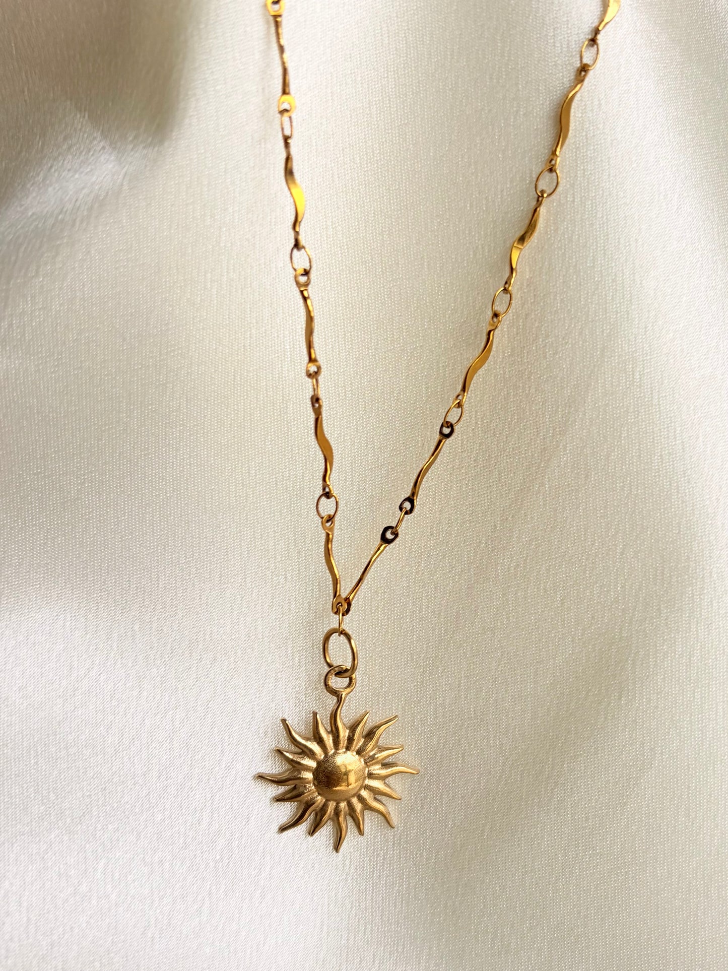SUN CHARM NECKLACE
